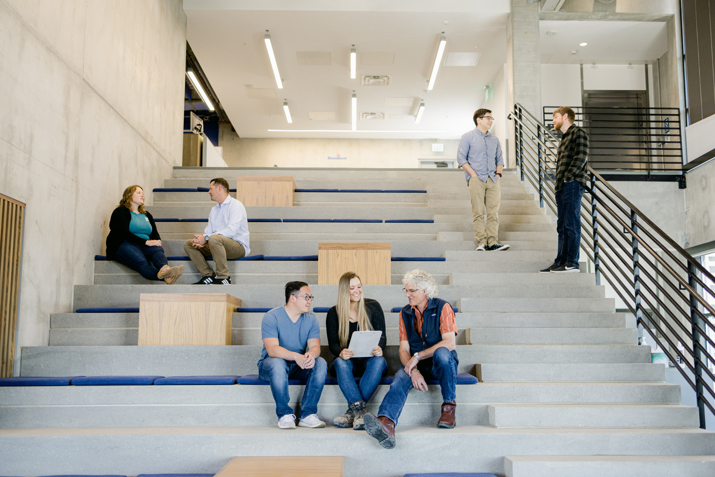 Wells staff meeting on stairway
